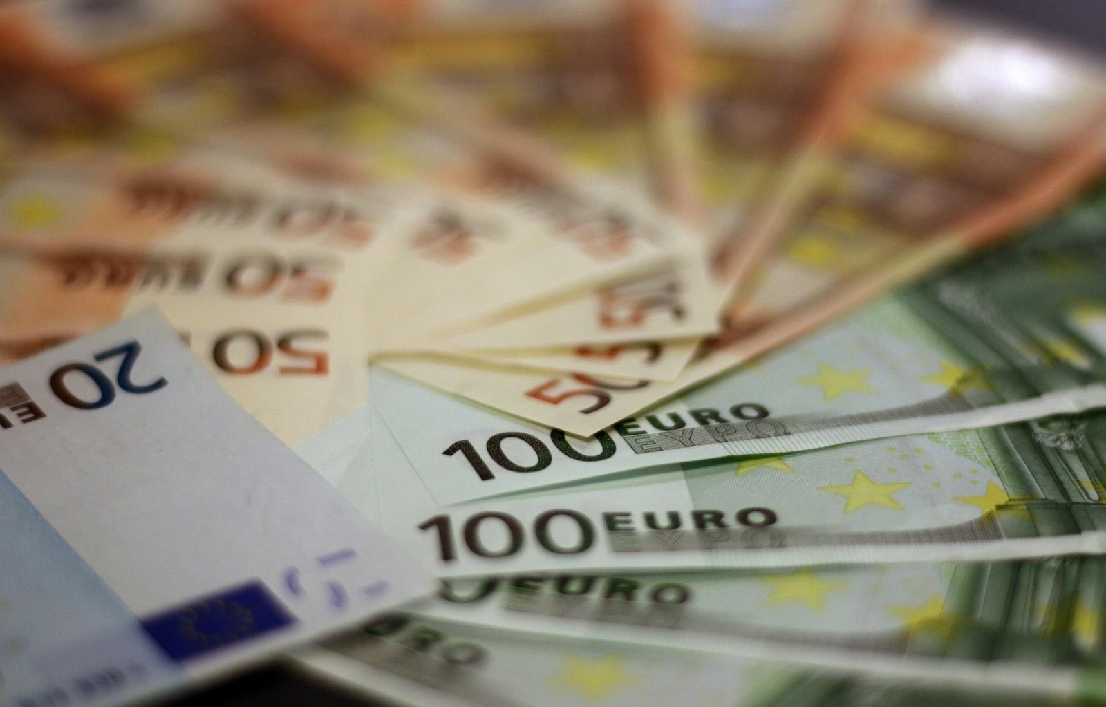 The Secret to Running a Profitable Business 1 Close-up of various euro banknotes fanned out, symbolizing wealth and financial success.